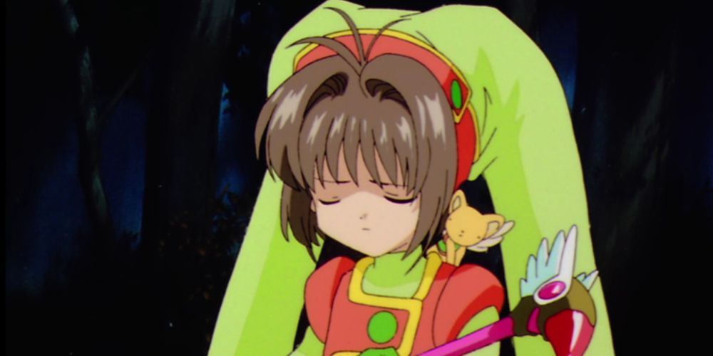 Cardcaptor Sakura cries in a green outfit in Cardcaptor Sakura.