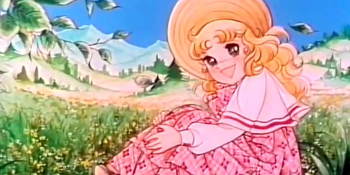 Candy is sitting in a field of flowers in Candy Candy.