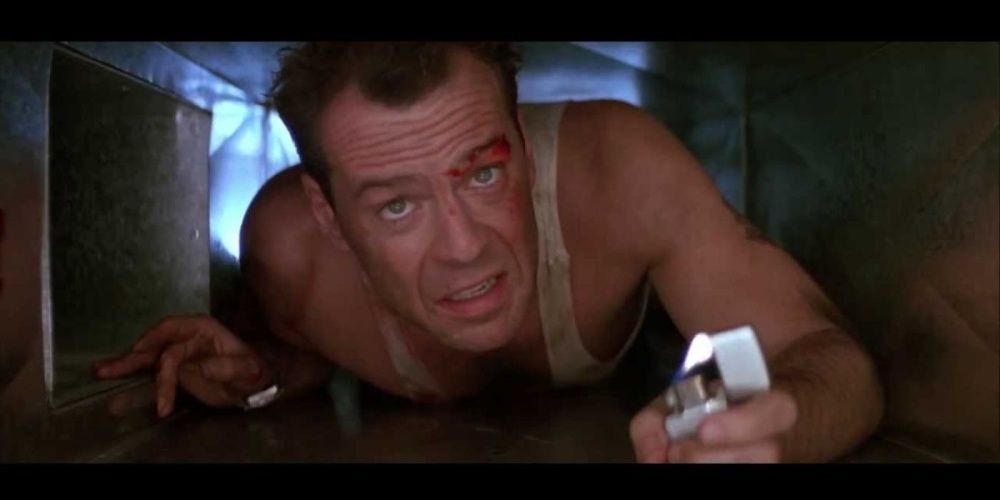 Bruce Willis crawling in a vent in Die Hard