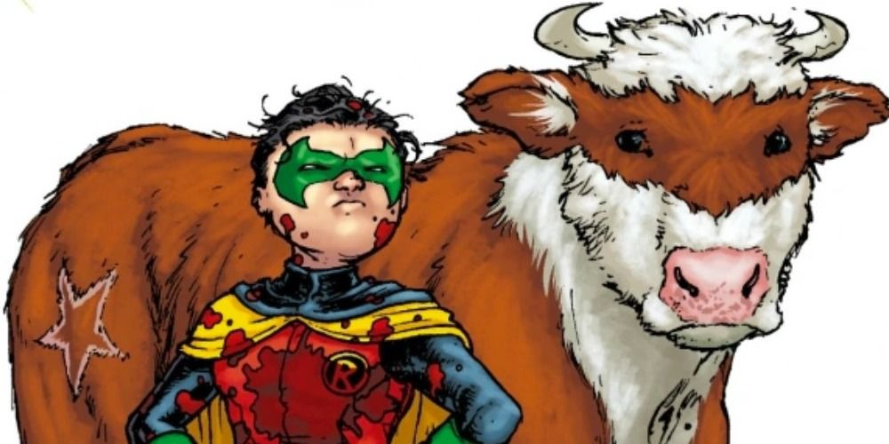 Damian Wayne and Batcow with blood on their faces