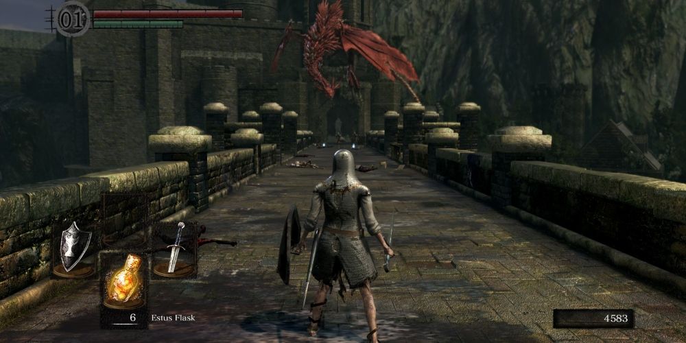 A character crossking the Hellkite Drake's bridge in Dark Souls