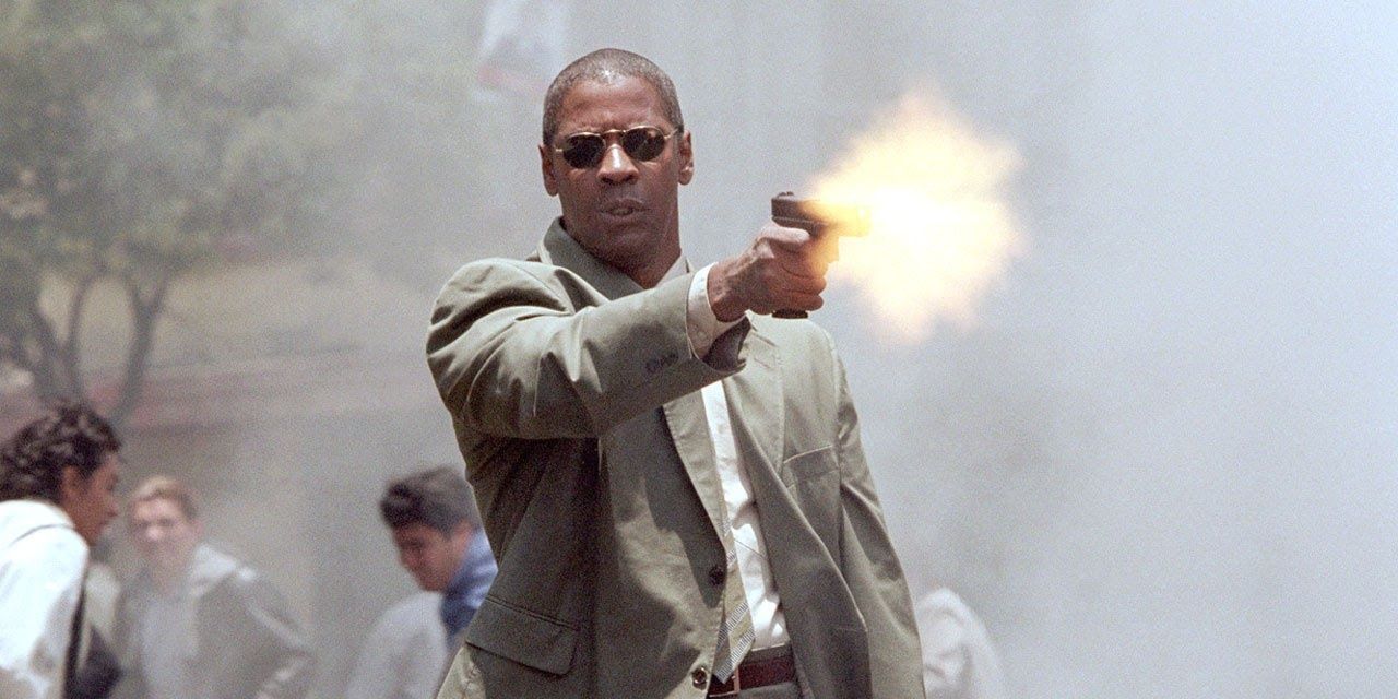 Denzel Washington shooting a gun In Man On Fire