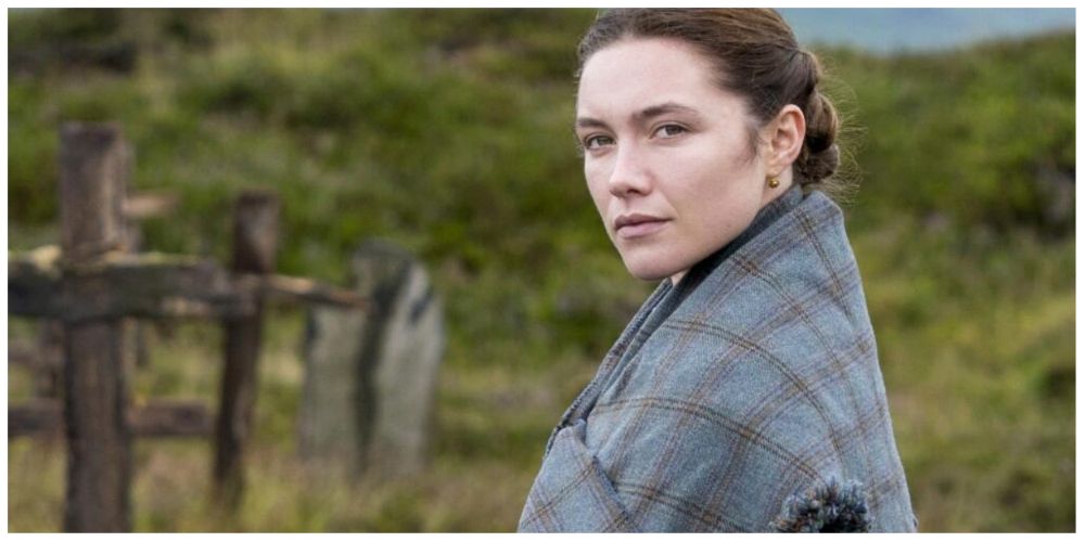 Florence Pugh looking out in the countryside in The Wonder