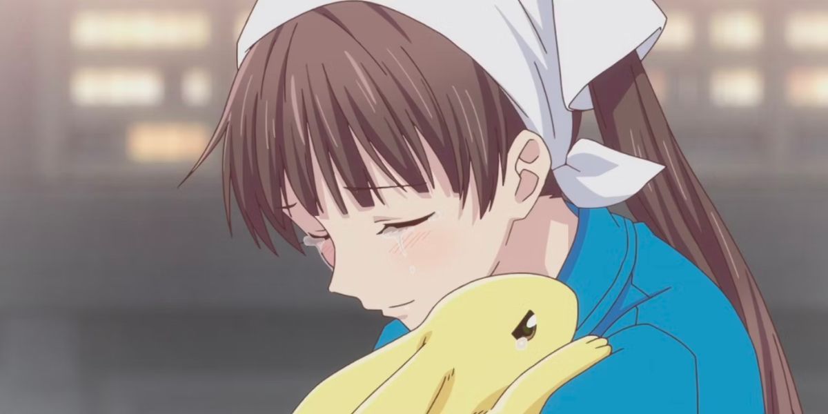 Tohru is hugging a crying "bunny-version" of Momiji (Fruits Basket)