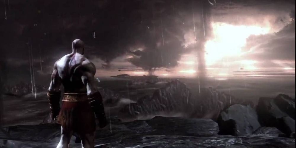 Kratos looks out over a ruined Greece in the ending to God of War III