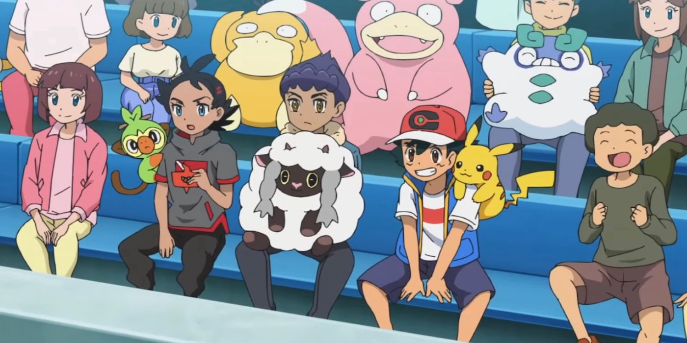 Goh, Hop, and Ash watch the Masters Eight of the World Coronation Series in Pokémon Journeys