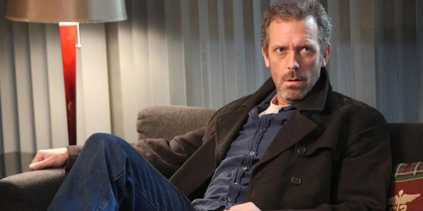 Dr. House sitting on a couch in his office in House.