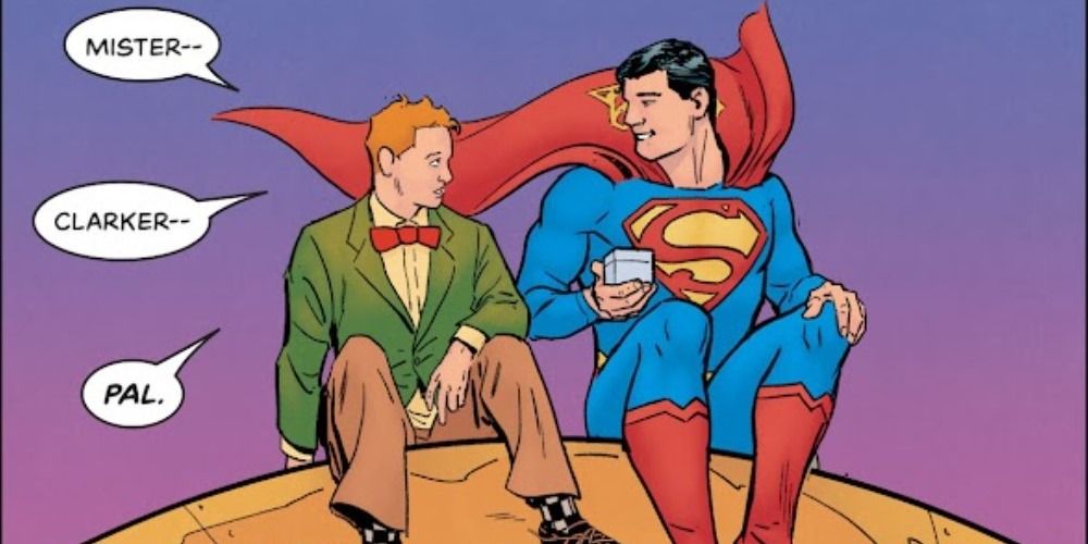 Jimmy Olsen and Superman hang out at the top of the Daily Planet building