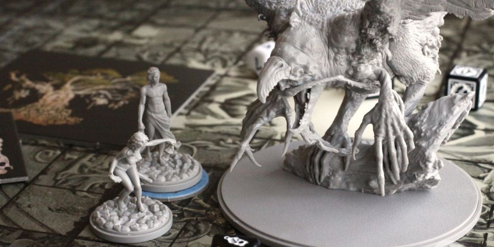 A pair of hunters fighting a monster in Kingdom Death: Monster game.