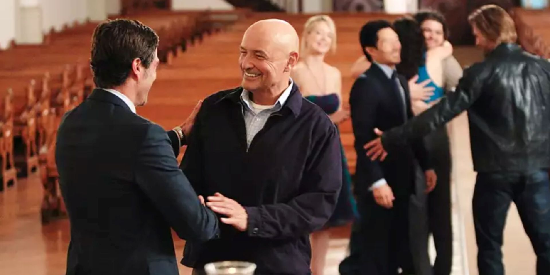 Jack and Locke shake hands as they join the others in the church in the Lost finale