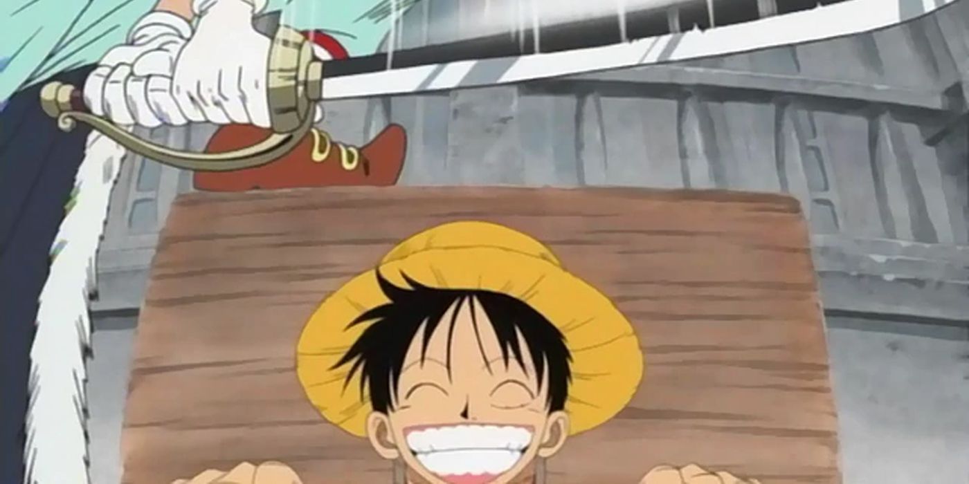 Luffy smiles in buggy the clown is about to execute it during the loguetown arc of a room.