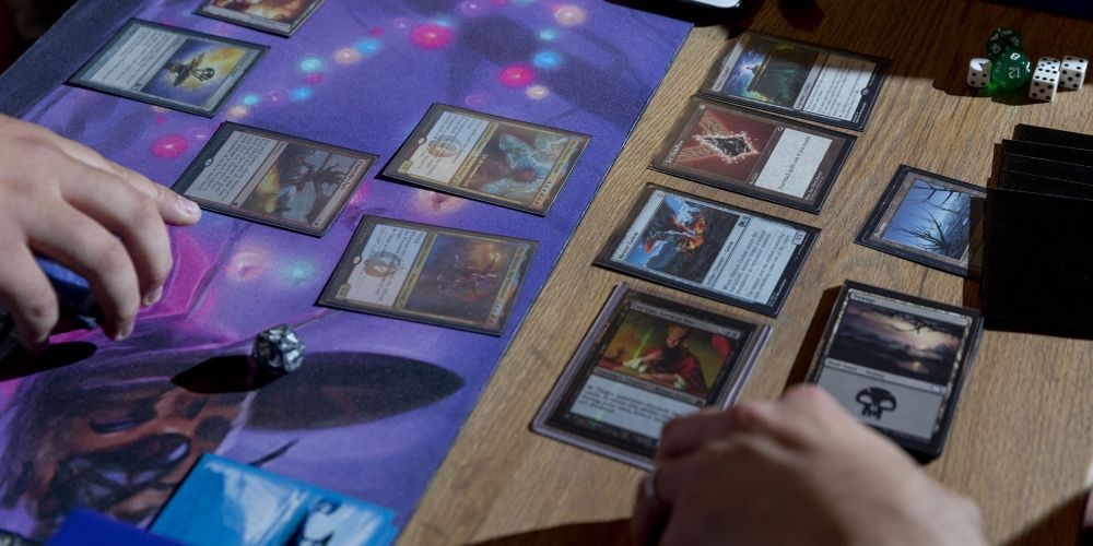 Two players facing off in a game of Magic: the Gathering