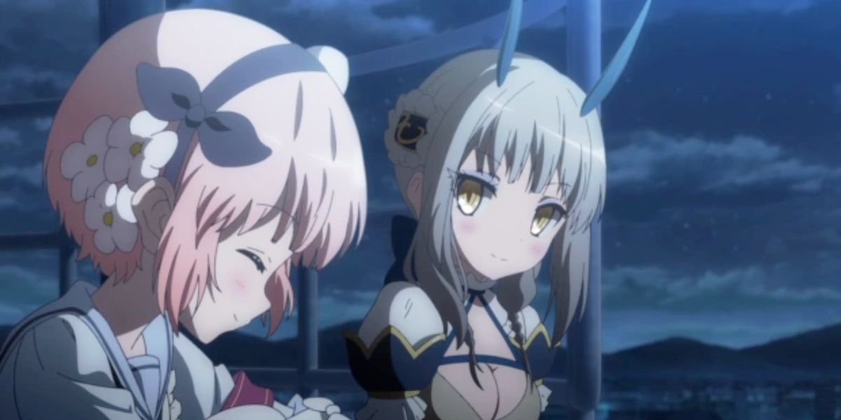 Image features a visual from Magical Girl Raising Project: (From left to right) Snow White (pink hair and flowery headband) is talking with La Pucelle (silver-green hair and blue antennae).