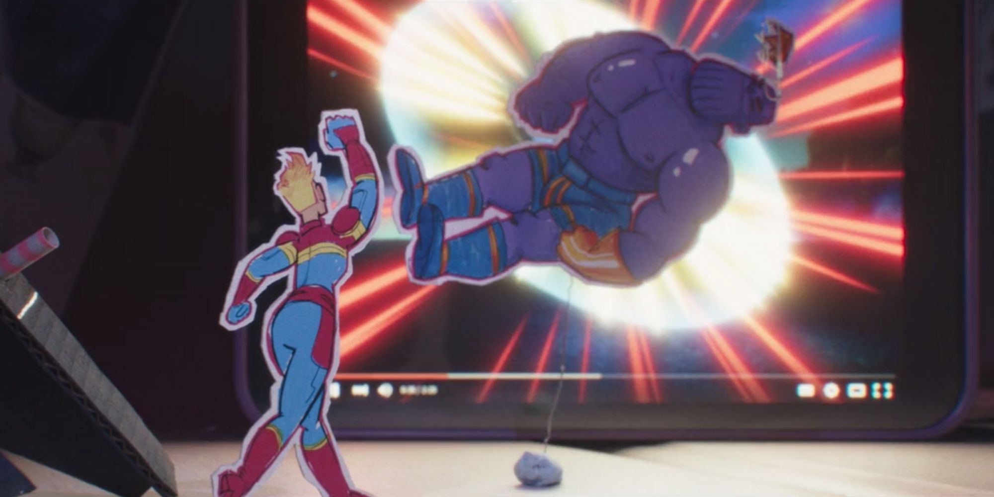 Captain Marvel punches Thanos in a paper craft animation made by Kamala Khan in Ms. Marvel.