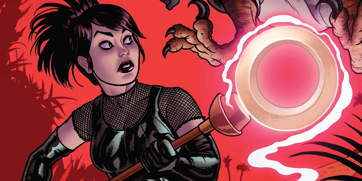 Nico Minoru with the Staff of One about to hit a bird-like creature