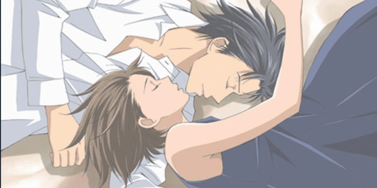 Image features a visual from Nodame Cantabile: (From left to right) Shinichi Chiaki (short, black hair and white dress shirt) and Megumi Noda (short, brown hair and navy dress) lying down.