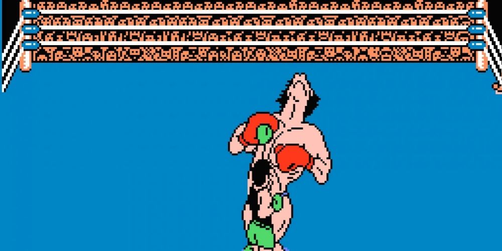 Little Mac taking out a much larger opponent in Punch Out!! game