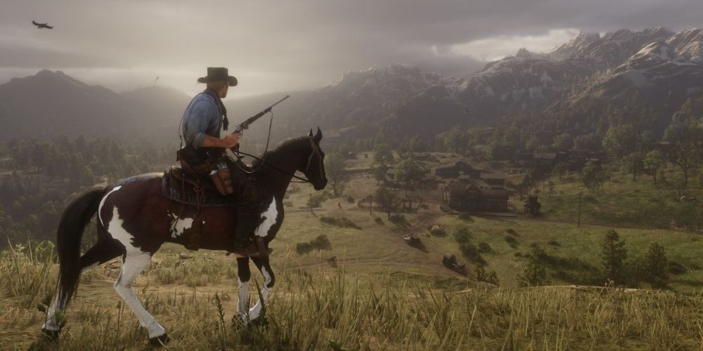 Arthur Morgan riding through the open world in Red Dead Redemption II game