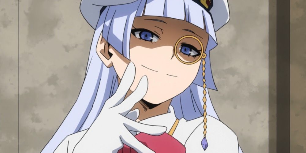 Saiko Intelli smiling with two fingers on her cheek