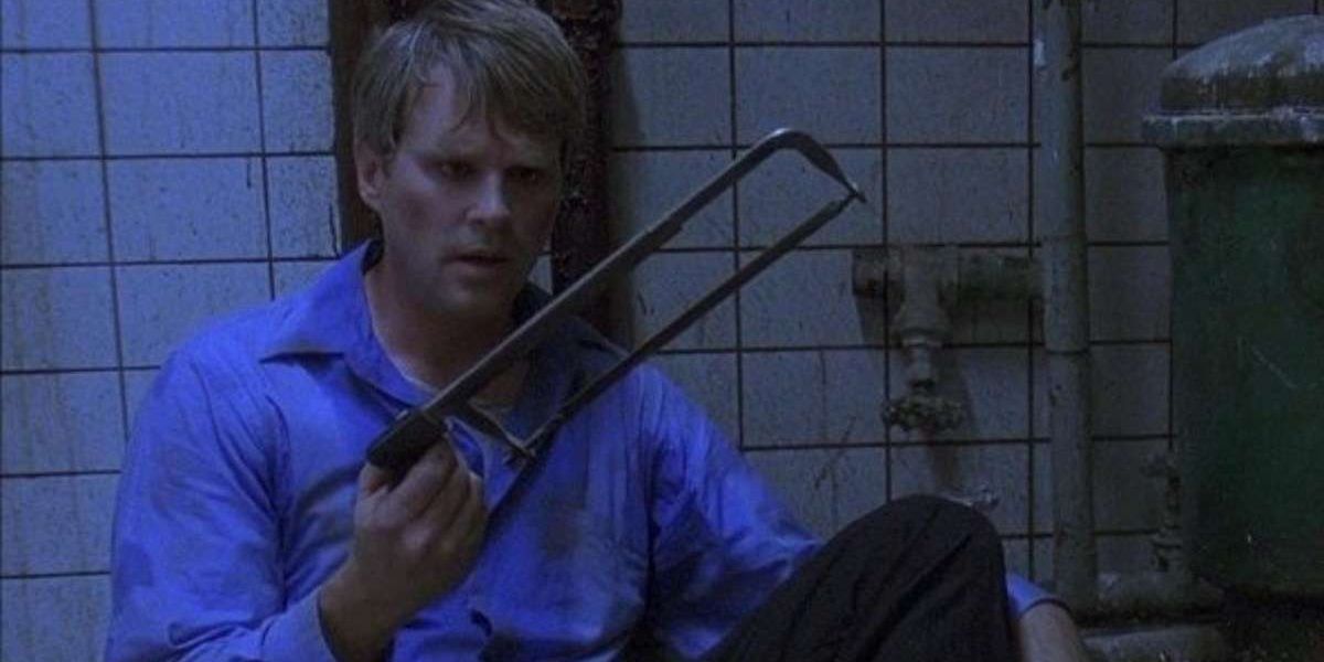 Saw: Cary Elwes contemplates cutting off his own foot with a hacksaw