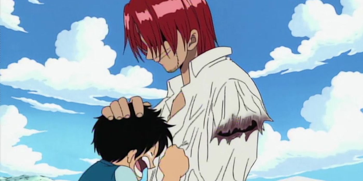 Shanks holding a crying Luffy in One Piece.