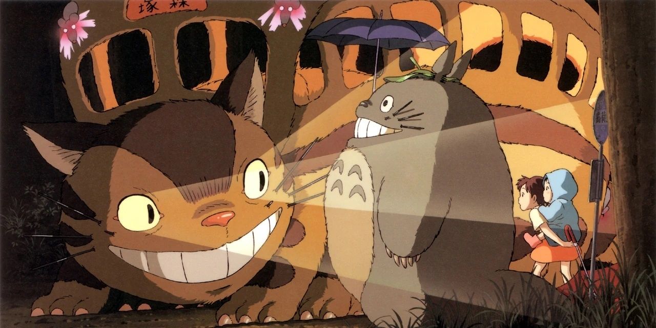 The Catbus from My Neighbor Totoro shining its lights on Totoro.
