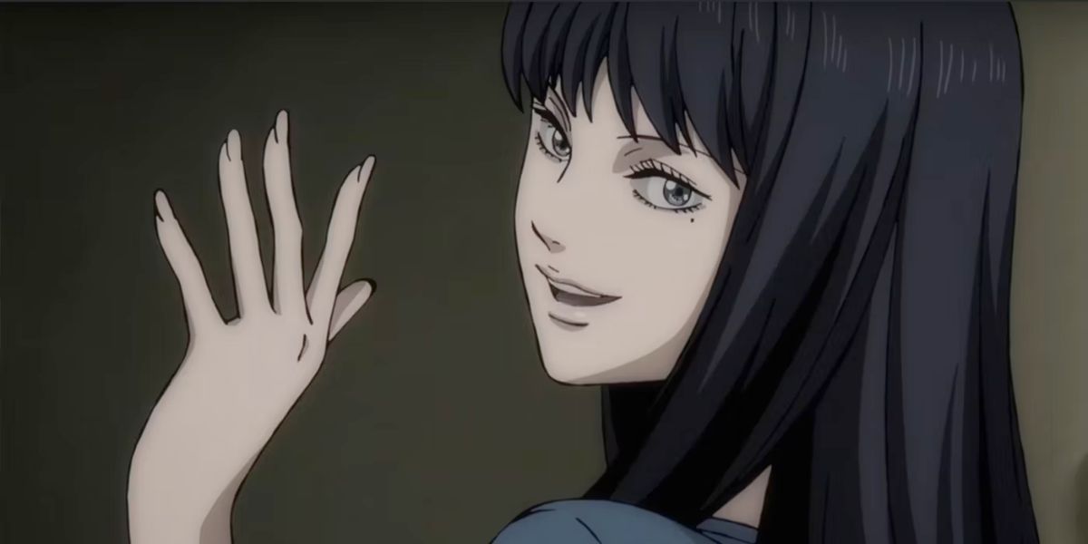 Image features a visual from Tomie: (From left to right) Tomie (long, black hair) is waving.