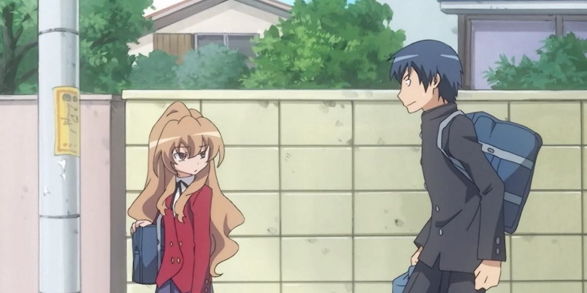 Taiga is glaring at Ryuji outside the school in Toradora!