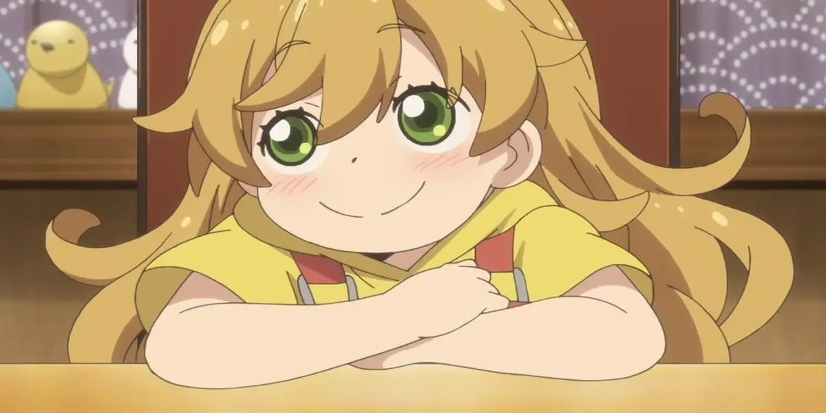 Tsumugi Inuzuka smiling upward while resting her arms on a table - Sweetness and Lightning.