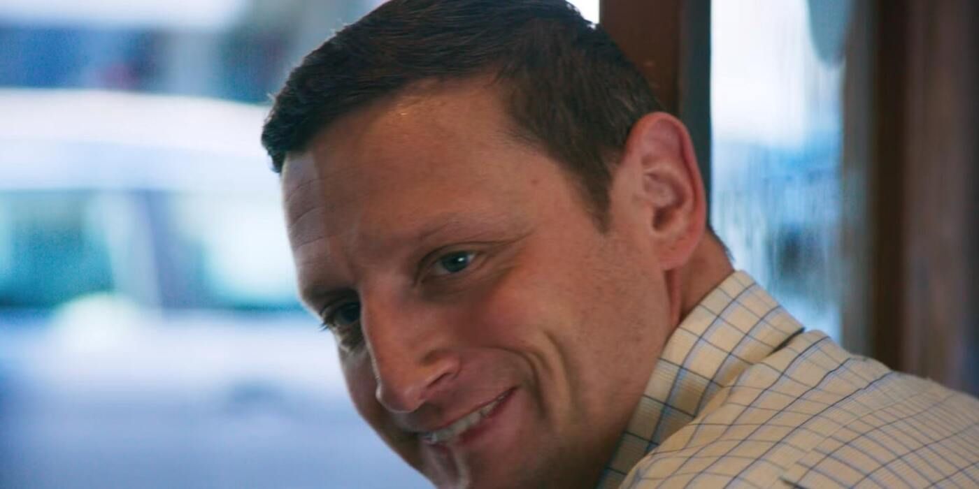 Tim Robinson smiles by a window in Netflix's I Think You Should Leave