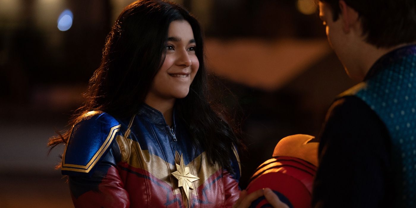 Ms. Marvel's Kamala Khan in her costume, smiling while looking at Bruno
