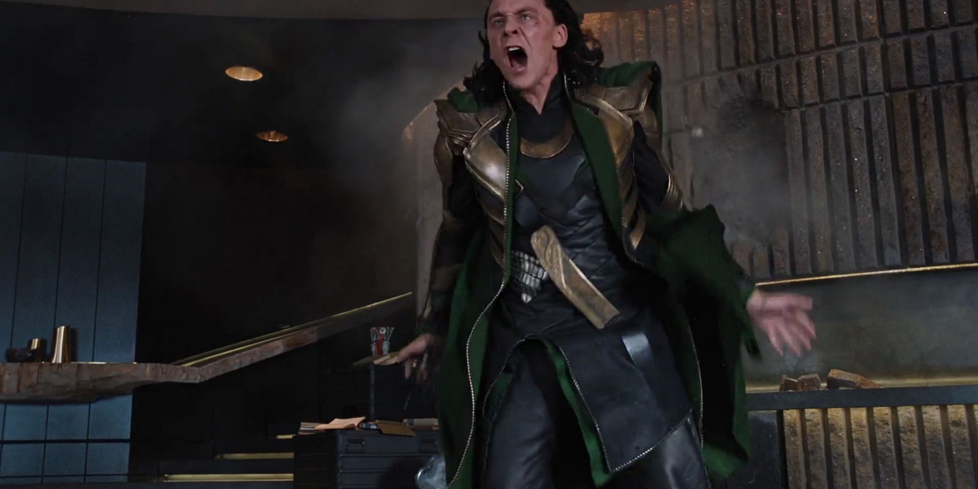 Loki from The Avengers yells at the Hulk.