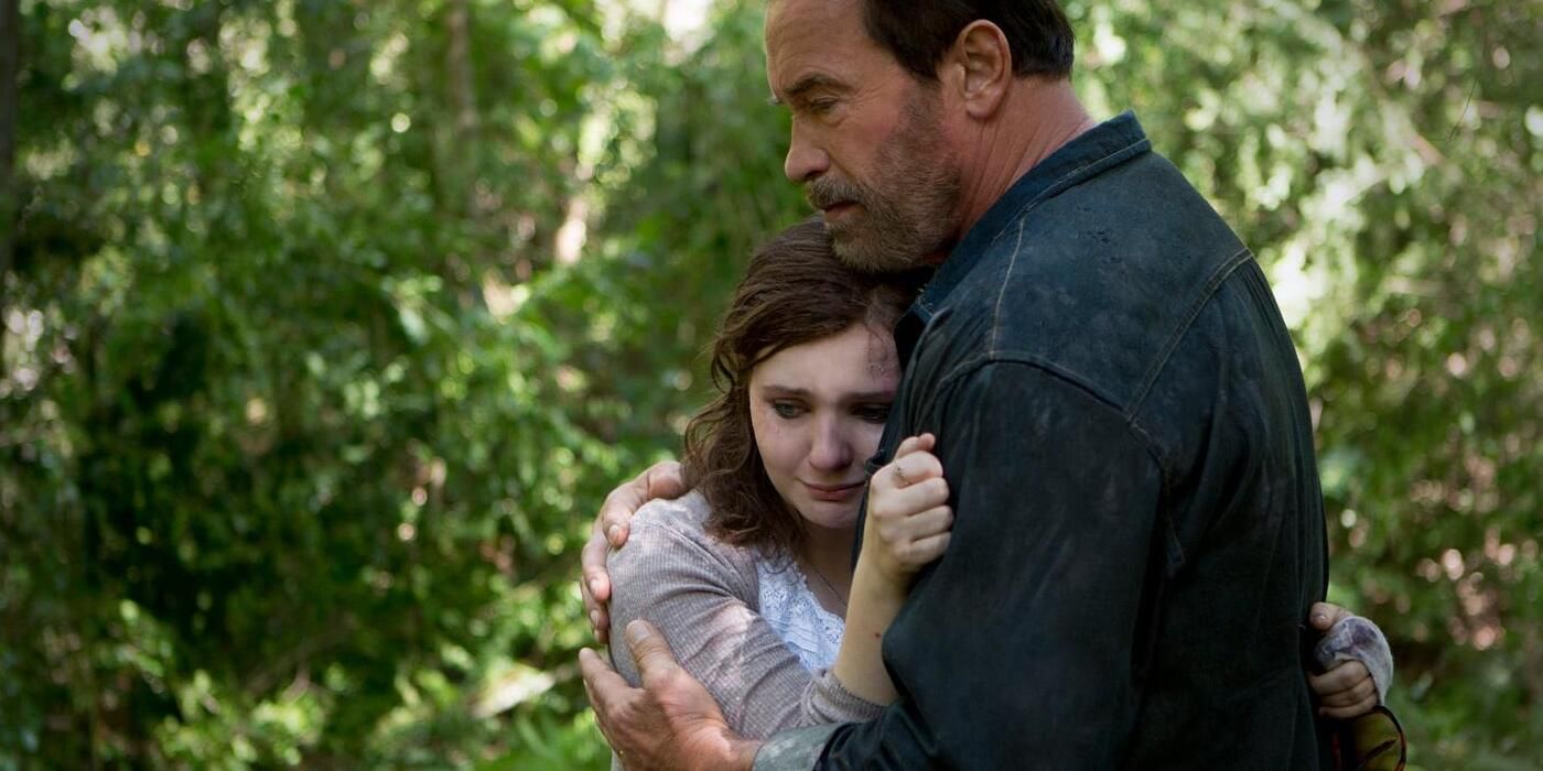 Maggie hugging her dad.