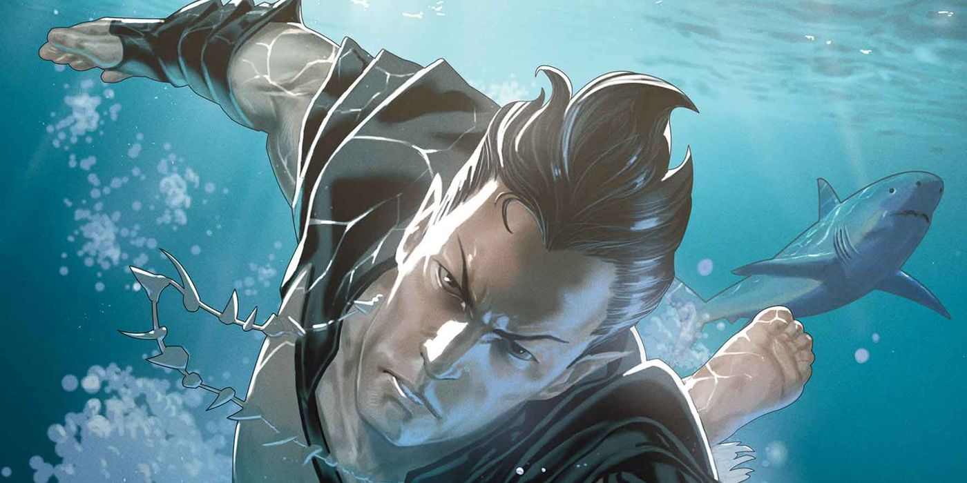 Namor swims through the ocean with a determined look on his face.