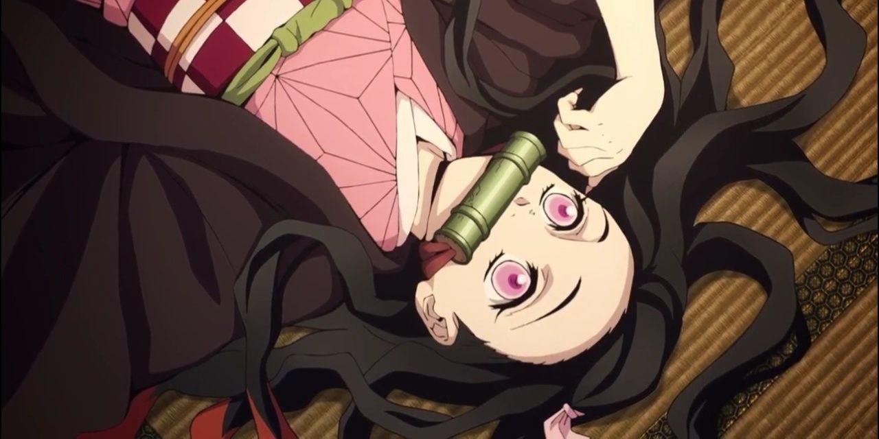 Nezuko Kamado laying on the floor in Demon Slayer.