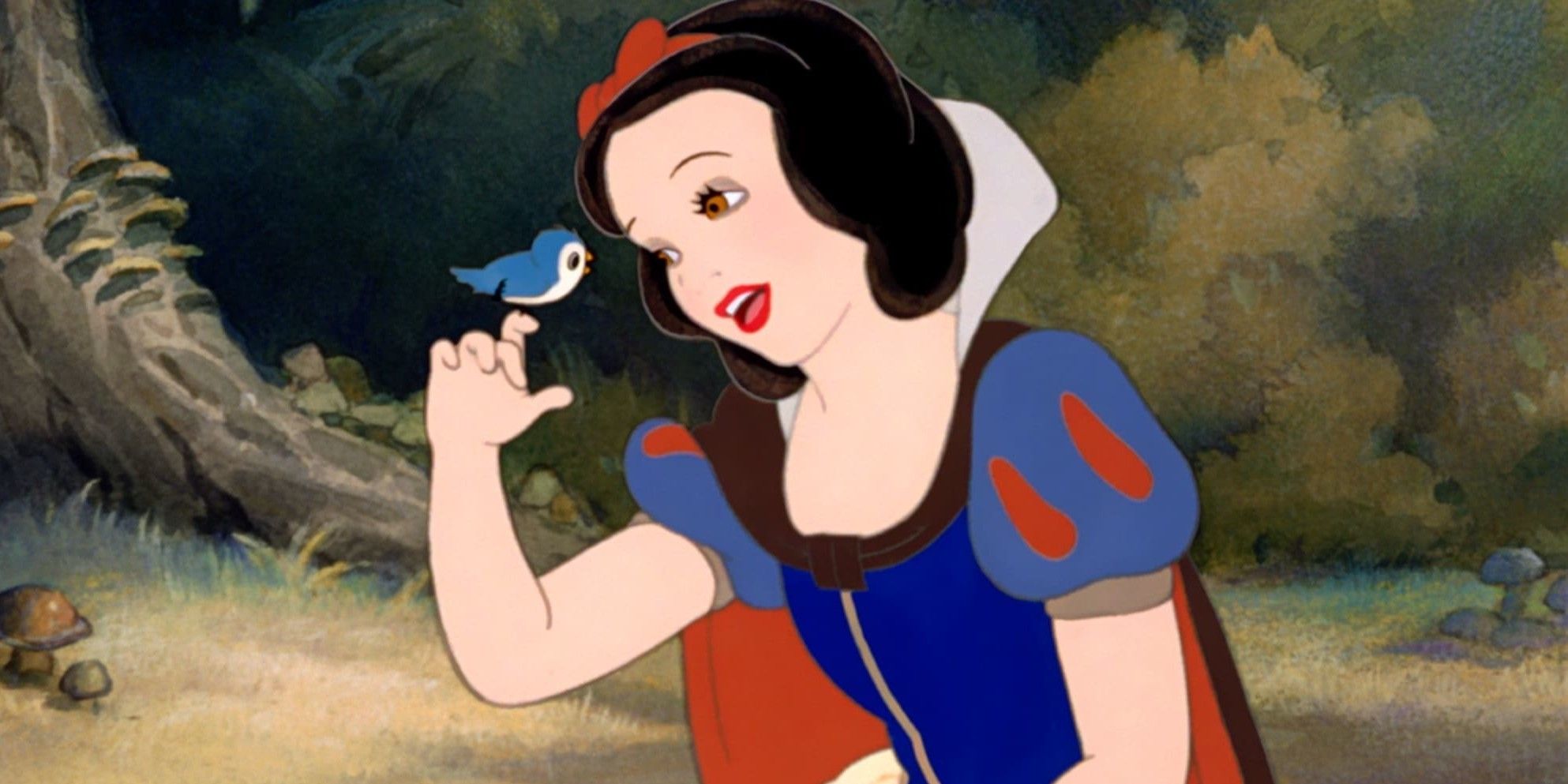 Snow White singing to a bird in Disney's animated Snow White And The Seven Dwarfs.