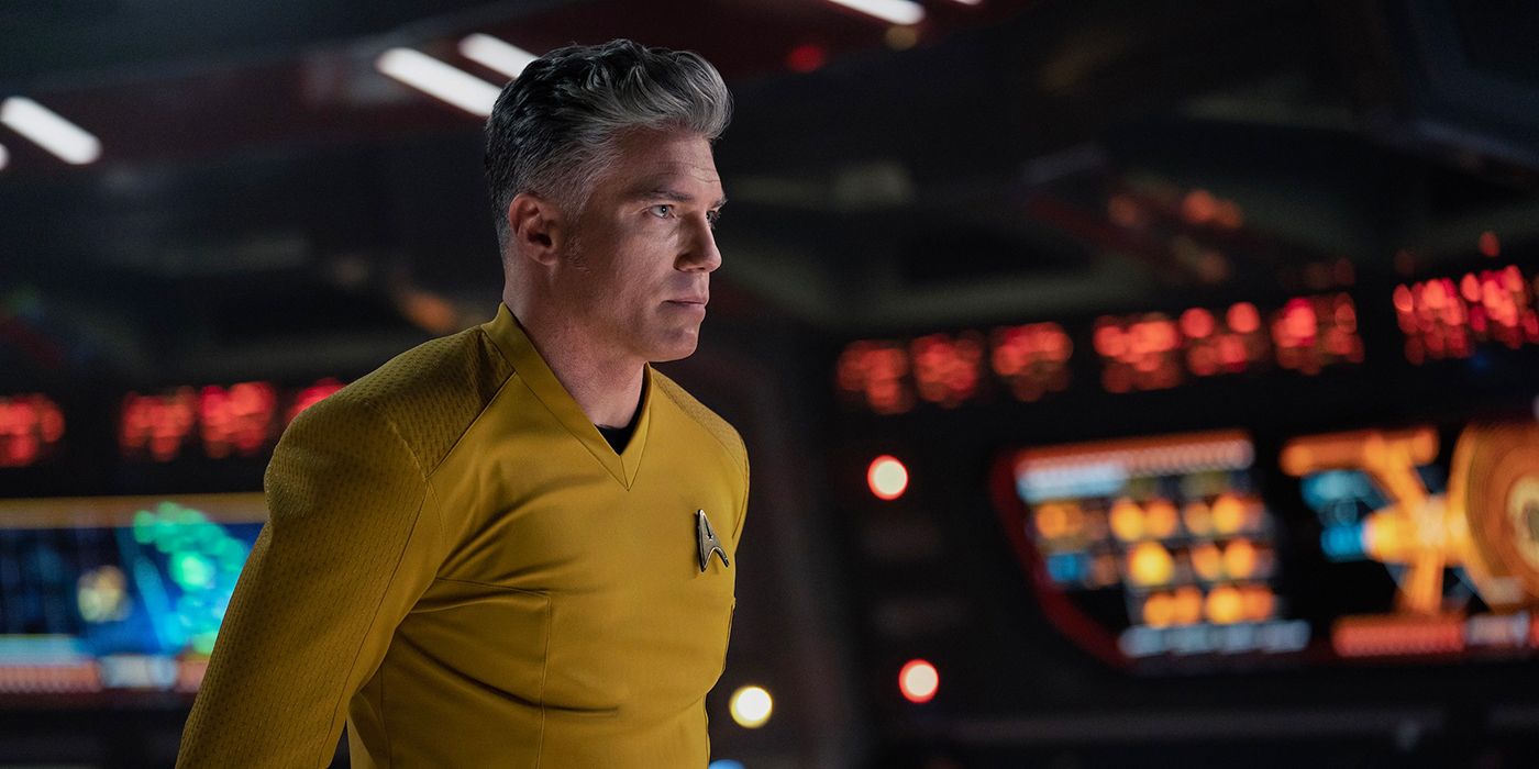 Captain Pike (Anson Mount) looks off on the Enterprise bridge in Star Trek: Strange New Worlds.