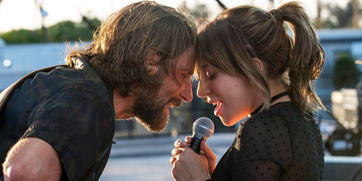 Lady Gaga and Bradley Cooper singing in A Star Is Born.