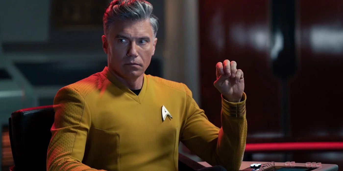 Star Trek: Strange New Worlds' Captain Pike (Anson Mount) sits on the bridge of the Enterprise.