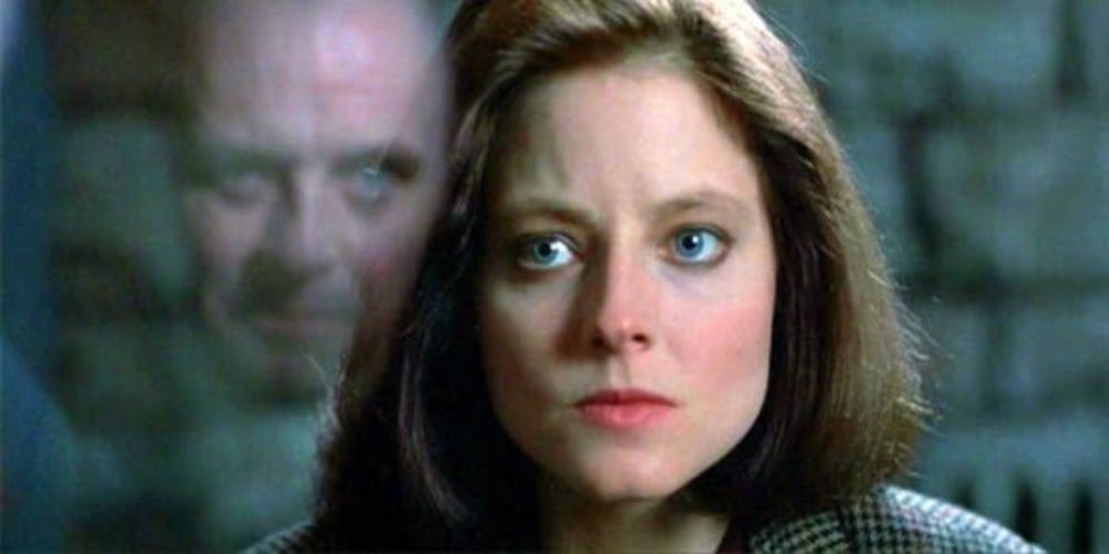  Hannibal Lector and Clarice stare down from the silence of the lambs