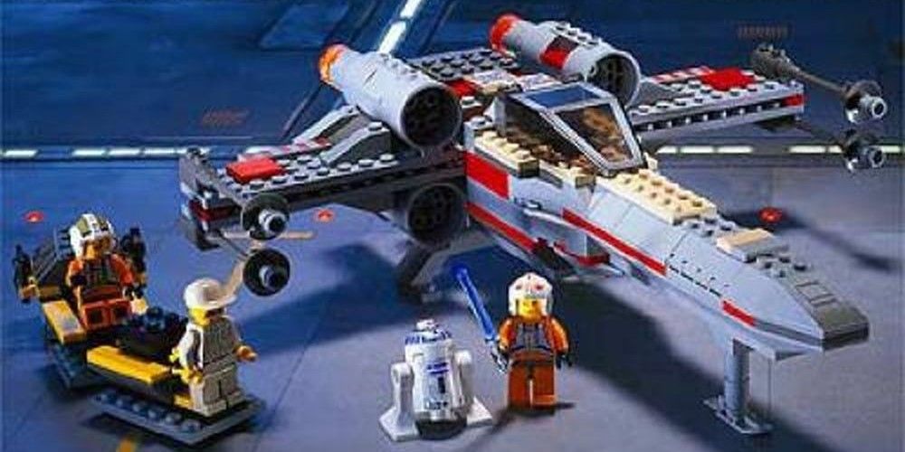 Luke Skywalker, Biggs e R2-D2 ao lado de um Lego Star Wars X-Wing