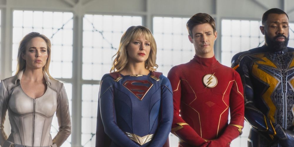 Several characters from the Arrowverse standing together, including Supergirl and the Flash