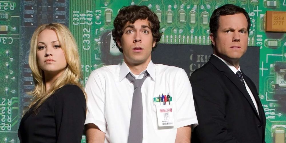 Chuck, Casey, and Sarah pose in front of a computer motherboard in Chuck TV show