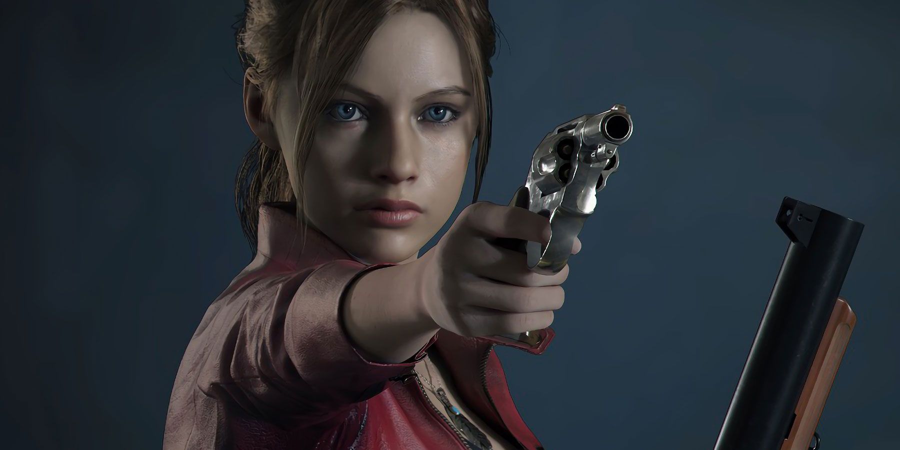 Claire Redfield wielding a gun in the Resident Evil 2 remake.