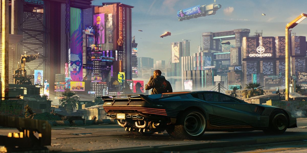 The protagonist of Cyberpunk 2077 looks out over the city