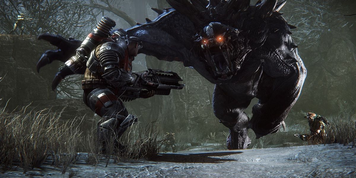 A player being chased by a giant monster in Evolve