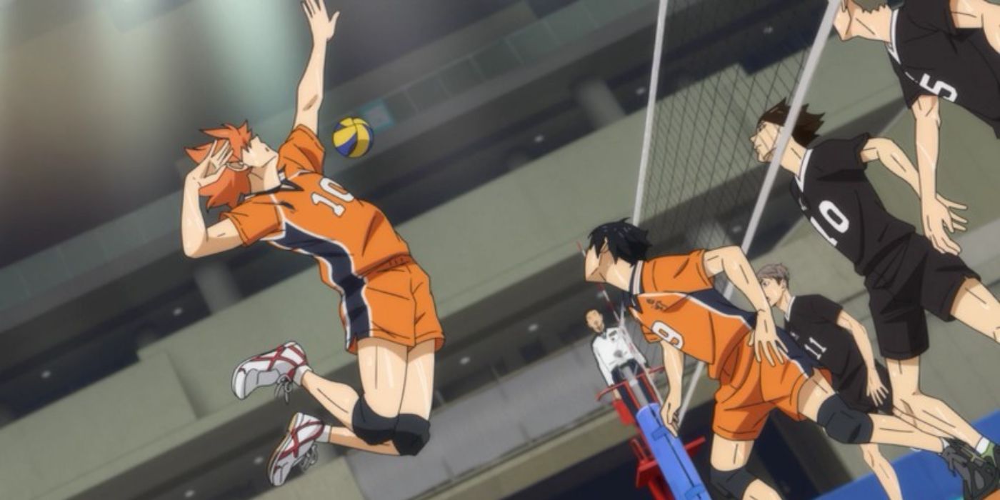 Shoyo Hinata jumps in front of the net in Haikyuu!