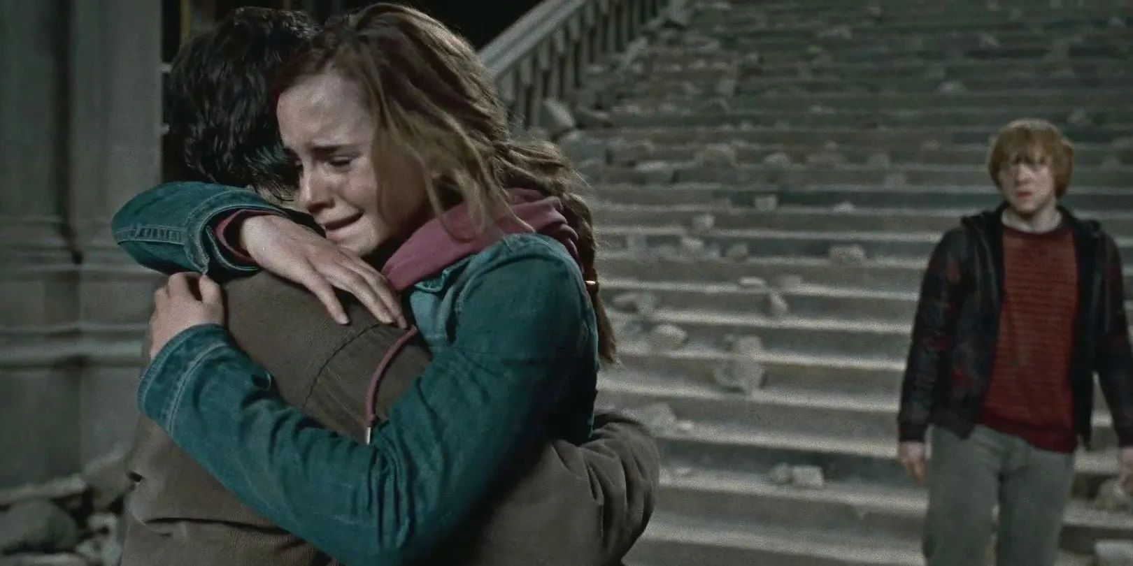 Hermione hugs Harry