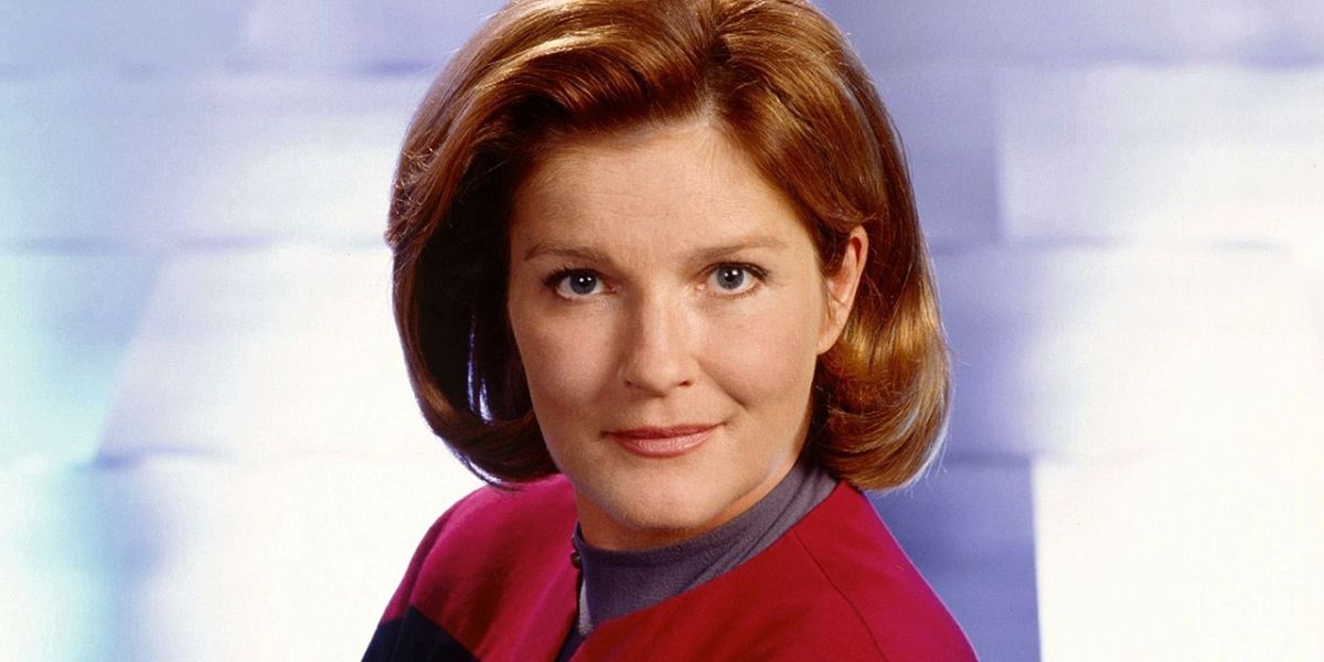 Captain Kathryn Janeway smiles in a Star Trek Voyager promo