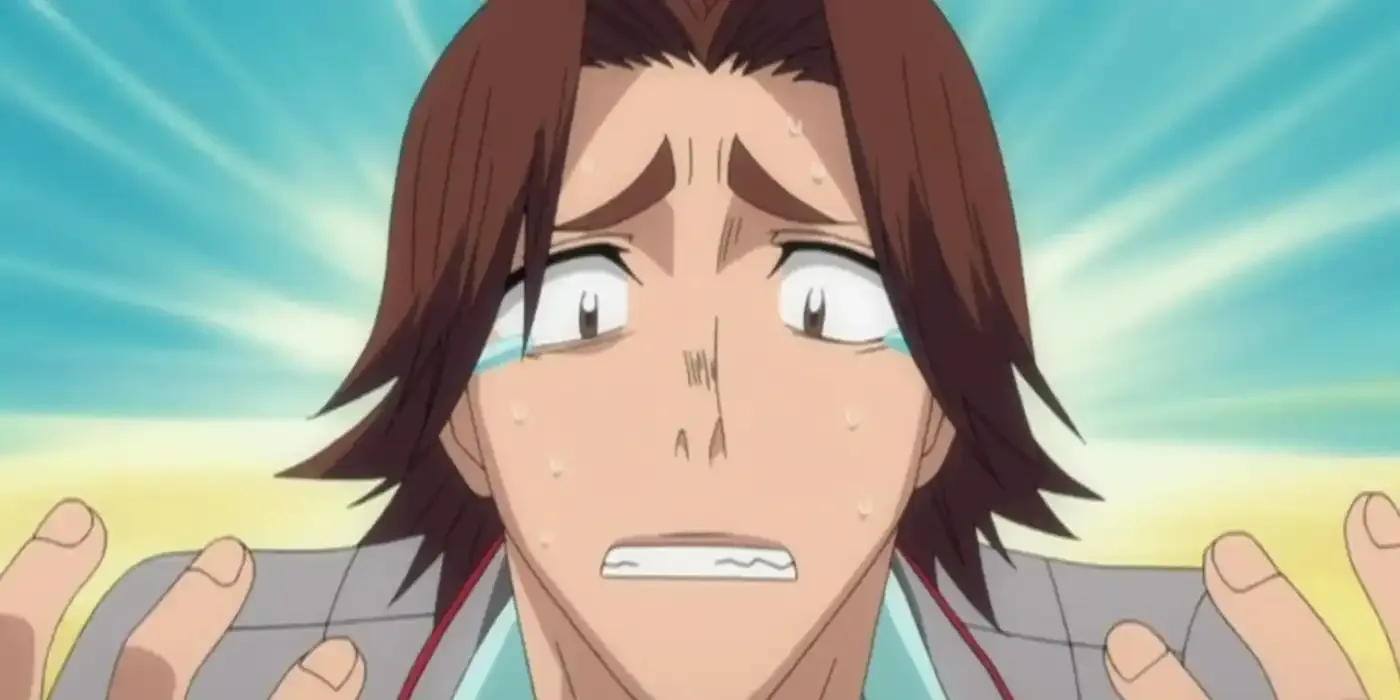 Keigo Asano from Bleach crying with his hands up.
